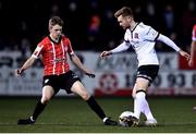 18 February 2022; Paul Doyle of Dundalk and Ciaron Harkin of Derry City during the SSE Airtricity League Premier Division match between Dundalk and Derry City at Oriel Park in Dundalk, Louth. Photo by Ben McShane/Sportsfile