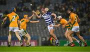 5 February 2022; Cathal Dowling of Naas is tackled by Kilmoyley players, from left, Donal Kennedy, Paudie O'Connor, Matthew Flaherty and Colman Savage during the AIB GAA Hurling All-Ireland Intermediate Club Championship Final match between Kilmoyley, Kerry, and Naas, Kildare, at Croke Park in Dublin. Photo by Piaras Ó Mídheach/Sportsfile