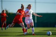 22 February 2022; Amber Barrett of Republic of Ireland competes for the ball with Rhiannon Roberts during the Pinatar Cup match between Republic of Ireland and Wales at Pinatar Arena in Murcia, Spain. Photo by Silvestre Szpylma/Sportsfile