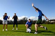 23 February 2022; Jamie Murray kicks with Leinster Rugby players Ed Byrne, Adam Byrne and Eimear Corri during the 2022 Bank of Ireland Leinster Rugby School of Excellence launch at UCD in Dublin. Photo by Harry Murphy/Sportsfile