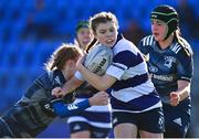 24 February 2022; Julie Nolan of North Midlands in action against Robin Hyland, left, and Katie Colton of Metro during the Bank of Ireland Leinster Rugby Sarah Robinson Cup Round 3 match between Metro and North Midlands at Energia Park in Dublin. Photo by Seb Daly/Sportsfile