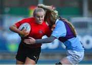 24 February 2022; Anna Hiliard of North East is tackled by Jane Neill of South East during the Bank of Ireland Leinster Rugby Sarah Robinson Cup Round 3 match between South East and North East at Energia Park in Dublin. Photo by Seb Daly/Sportsfile
