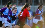24 February 2022; Isabele Bereton of North East evades the tackle of South East's Ciara Short during the Bank of Ireland Leinster Rugby Sarah Robinson Cup Round 3 match between South East and North East at Energia Park in Dublin. Photo by Seb Daly/Sportsfile