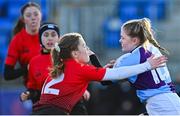 24 February 2022; Ciara Short of South East in action against Cara Martin of North East during the Bank of Ireland Leinster Rugby Sarah Robinson Cup Round 3 match between South East and North East at Energia Park in Dublin. Photo by Seb Daly/Sportsfile