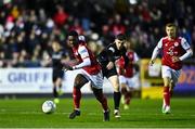 25 February 2022; James Abankwah of St Patrick's Athletic in action against Aidan Keena of Sligo Rovers during the SSE Airtricity League Premier Division match between St Patrick's Athletic and Sligo Rovers at Richmond Park in Dublin. Photo by Eóin Noonan/Sportsfile