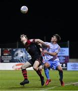 25 February 2022; Andrew Quinn of Drogheda United in action against Daniel Hawkins of Shelbourne during the SSE Airtricity League Premier Division match between Drogheda United and Shelbourne at Head in the Game Park in Drogheda, Louth. Photo by Ramsey Cardy/Sportsfile
