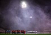 25 February 2022; Players and officials stand for a minutes silence during the SSE Airtricity League Premier Division match between Bohemians and Dundalk at Dalymount Park in Dublin. Photo by Michael P Ryan/Sportsfile