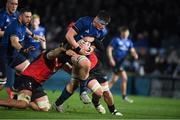25 February 2022; Joe McCarthy of Leinster is tackled by Ruben Schoeman and Francke Horn of Emirates Lions during the United Rugby Championship match between Leinster and Emirates Lions at RDS Arena in Dublin. Photo by Matt Browne/Sportsfile