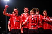 25 February 2022; Will Patching celebrates with Derry City team-mates, including Joe Thomson, left, after scoring their side's first goal during the SSE Airtricity League Premier Division match between Derry City and Shamrock Rovers at The Ryan McBride Brandywell Stadium in Derry. Photo by Stephen McCarthy/Sportsfile
