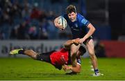 25 February 2022; Max O'Reilly of Leinster is tackled by Stean Pienaar of Emirates Lions during the United Rugby Championship match between Leinster and Emirates Lions at the RDS Arena in Dublin. Photo by Seb Daly/Sportsfile