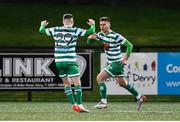 25 February 2022; Dylan Watts of Shamrock Rovers celebrates after scoring his side's first goal with team-mate Jack Byrne, left, during the SSE Airtricity League Premier Division match between Derry City and Shamrock Rovers at The Ryan McBride Brandywell Stadium in Derry. Photo by Stephen McCarthy/Sportsfile