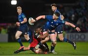 25 February 2022; Joe McCarthy of Leinster is tackled by Ruan Dreyer and Lunga Ncube of Emirates Lions during the United Rugby Championship match between Leinster and Emirates Lions at the RDS Arena in Dublin. Photo by Seb Daly/Sportsfile