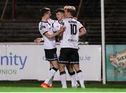 25 February 2022; Steven Bradley of Dundalk, centre, celebrates after scoring his side's second goal with teammates Daniel Kelly, left, and Greg Sloggett during the SSE Airtricity League Premier Division match between Bohemians and Dundalk at Dalymount Park in Dublin. Photo by Michael P Ryan/Sportsfile