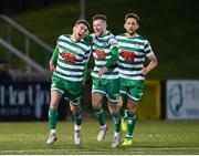 25 February 2022; Dylan Watts of Shamrock Rovers celebrates after scoring his side's first goal with teammate Jack Byrne, centre, during the SSE Airtricity League Premier Division match between Derry City and Shamrock Rovers at The Ryan McBride Brandywell Stadium in Derry. Photo by Stephen McCarthy/Sportsfile
