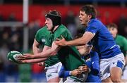 25 February 2022; Conor O’Tighearnaigh of Ireland is tackled by Filippo Lazzarin and Francois Carlo Mey of Italy during the Guinness U20 Six Nations Rugby Championship match between Ireland and Italy at Musgrave Park in Cork. Photo by Brendan Moran/Sportsfile