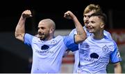 25 February 2022; Mark Coyle of Shelbourne celebrates with teammate John Ross Wilson, right, after scoring their side's second goal during the SSE Airtricity League Premier Division match between Drogheda United and Shelbourne at Head in the Game Park in Drogheda, Louth. Photo by Ramsey Cardy/Sportsfile