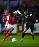 25 February 2022; Tunde Owolabi of St Patrick's Athletic in action against Adam McDonnell of Sligo Rovers during the SSE Airtricity League Premier Division match between St Patrick's Athletic and Sligo Rovers at Richmond Park in Dublin. Photo by Eóin Noonan/Sportsfile
