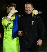 25 February 2022; Finn Harps goalkeeper Mark McGinley shares a joke with UCD coach William O'Connor after the drawn SSE Airtricity League Premier Division match between UCD and Finn Harps at UCD Bowl in Belfield, Dublin. Photo by Piaras Ó Mídheach/Sportsfile