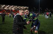 25 February 2022; Derry City goalkeeper Brian Maher with a supporter after the SSE Airtricity League Premier Division match between Derry City and Shamrock Rovers at The Ryan McBride Brandywell Stadium in Derry. Photo by Stephen McCarthy/Sportsfile
