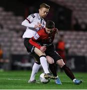 25 February 2022; Paul Doyle of Dundalk in action against Jamie Mullins of Bohemians during the SSE Airtricity League Premier Division match between Bohemians and Dundalk at Dalymount Park in Dublin. Photo by Michael P Ryan/Sportsfile