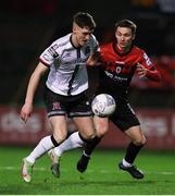 25 February 2022; John Martin of Dundalk in action against Tyreke Wilson of Bohemians during the SSE Airtricity League Premier Division match between Bohemians and Dundalk at Dalymount Park in Dublin. Photo by Michael P Ryan/Sportsfile