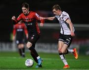 25 February 2022; Stephen Mallon of Bohemians in action against Daniel Kelly of Dundalk during the SSE Airtricity League Premier Division match between Bohemians and Dundalk at Dalymount Park in Dublin. Photo by Michael P Ryan/Sportsfile