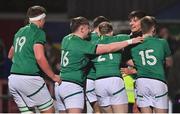25 February 2022; Chay Mullins of Ireland, second from right, celebrates with teammates after scoring their side's fourth try during the Guinness U20 Six Nations Rugby Championship match between Ireland and Italy at Musgrave Park in Cork. Photo by Brendan Moran/Sportsfile