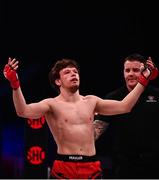25 February 2022; Ciaran Clarke celebrates after defeating Abou Tounkara in their featherweight bout at Bellator 275 at the 3Arena in Dublin. Photo by David Fitzgerald/Sportsfile