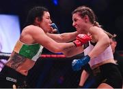 25 February 2022; Leah McCourt, right, in action against Sinead Kavanagh during their women's featherweight bout at Bellator 275 at the 3Arena in Dublin. Photo by David Fitzgerald/Sportsfile
