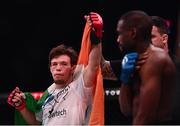 25 February 2022; Ciaran Clarke celebrates as opponent Abou Tounkara holds his injured shoulder which forced a stoppage in their featherweight bout at Bellator 275 at the 3Arena in Dublin. Photo by David Fitzgerald/Sportsfile