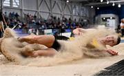 26 February 2022; Shane Howard of Bandon AC, Cork, on his way to winning the senior men's long jump during day one of the Irish Life Health National Senior Indoor Athletics Championships at the National Indoor Arena at the Sport Ireland Campus in Dublin. Photo by Sam Barnes/Sportsfile