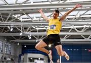 26 February 2022; Shane Howard of Bandon AC, Cork, on his way to winning the senior men's long jump during day one of the Irish Life Health National Senior Indoor Athletics Championships at the National Indoor Arena at the Sport Ireland Campus in Dublin. Photo by Sam Barnes/Sportsfile