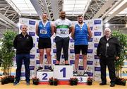 26 February 2022; Athletics Ireland President John Cronin, right, and Athletics Ireland National Field Events Coordinator Dave Sweeney, left, with senior men's shot put medallists, Eric Favors of Raheny Shamrock AC, Dublin, gold, James Kelly of Finn Valley AC, Donegal, silver and Gavin Mclaughlin of Finn Valley AC, Donegal, bronze, during day one of the Irish Life Health National Senior Indoor Athletics Championships at the National Indoor Arena at the Sport Ireland Campus in Dublin. Photo by Sam Barnes/Sportsfile