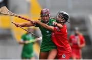 26 February 2022; Muireann Creamer of Limerick is tackled by Saoirse McCarthy of Cork during the Littlewoods Ireland Camogie League Division 1 Round 2 match between Cork and Limerick at Páirc Ui Chaoimh in Cork. Photo by Eóin Noonan/Sportsfile