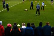 26 February 2022; Young spectators watch the Tipperary players warm up before the Allianz Hurling League Division 1 Group B match between Tipperary and Dublin at FBD Semple Stadium in Thurles, Tipperary. Photo by David Fitzgerald/Sportsfile