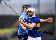 26 February 2022; Cathal Barrett of Tipperary is tackled by Danny Sutcliffe of Dublin during the Allianz Hurling League Division 1 Group B match between Tipperary and Dublin at FBD Semple Stadium in Thurles, Tipperary. Photo by David Fitzgerald/Sportsfile