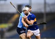 26 February 2022; Cathal Barrett of Tipperary is tackled by Danny Sutcliffe of Dublin during the Allianz Hurling League Division 1 Group B match between Tipperary and Dublin at FBD Semple Stadium in Thurles, Tipperary. Photo by David Fitzgerald/Sportsfile