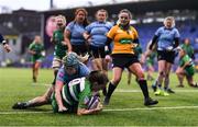 26 February 2022; Lauren Farrell McCabe of Suttonians scores her side's second try despite the tackle of Nolwenn Dubois of Galwegians during the Energia Women's All-Ireland League Conference Final match between Suttonians and Galwegians at Energia Park in Dublin. Photo by Ben McShane/Sportsfile