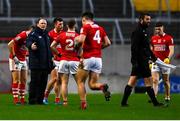 26 February 2022; Cork manager Keith Ricken speaks to his players on the pitch at half time during the Allianz Football League Division 2 match between Cork and Galway at Páirc Ui Chaoimh in Cork. Photo by Eóin Noonan/Sportsfile