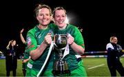 26 February 2022; Suttonians players Jessica Kelleher, left, and Aislinn Layde with the cup after the Energia Women's All-Ireland League Conference Final match between Suttonians and Galwegians at Energia Park in Dublin. Photo by Ben McShane/Sportsfile