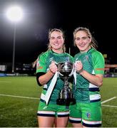 26 February 2022; Suttonians players and sisters, Lauren Farrell McCabe, left, and Kate Farrell McCabe with the cup after the Energia Women's All-Ireland League Conference Final match between Suttonians and Galwegians at Energia Park in Dublin. Photo by Ben McShane/Sportsfile