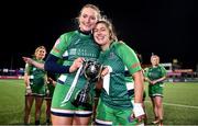 26 February 2022; Suttonians players Molly Fitzgerald, left, and Jullian O'Connor with the cup after the Energia Women's All-Ireland League Conference Final match between Suttonians and Galwegians at Energia Park in Dublin. Photo by Ben McShane/Sportsfile
