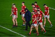 26 February 2022; Cork manager Keith Ricken, centre, leaves the pitch with his players after the Allianz Football League Division 2 match between Cork and Galway at Páirc Ui Chaoimh in Cork. Photo by Eóin Noonan/Sportsfile