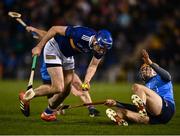 26 February 2022; John McGrath of Tipperary evades the tackle from Cian O'Callaghan of Dublin during the Allianz Hurling League Division 1 Group B match between Tipperary and Dublin at FBD Semple Stadium in Thurles, Tipperary. Photo by David Fitzgerald/Sportsfile