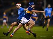 26 February 2022; John McGrath of Tipperary in action against Paddy Smyth of Dublin during the Allianz Hurling League Division 1 Group B match between Tipperary and Dublin at FBD Semple Stadium in Thurles, Tipperary. Photo by David Fitzgerald/Sportsfile