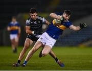 26 February 2022; Mark Russell of Tipperary in action against Niall Murphy of Sligo during the Allianz Football League Division 4 match between Tipperary and Sligo at FBD Semple Stadium in Thurles, Tipperary. Photo by David Fitzgerald/Sportsfile