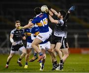 26 February 2022; Nathan Mullen of Sligo in action against Mikey O'Shea of Tipperary during the Allianz Football League Division 4 match between Tipperary and Sligo at FBD Semple Stadium in Thurles, Tipperary. Photo by David Fitzgerald/Sportsfile