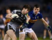 26 February 2022; Luke Towey of Sligo in action against Mark Russell of Tipperary during the Allianz Football League Division 4 match between Tipperary and Sligo at FBD Semple Stadium in Thurles, Tipperary. Photo by David Fitzgerald/Sportsfile