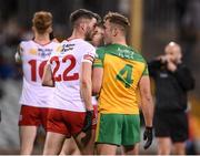 26 February 2022; Richard Donnelly of Tyrone and Stephen McMenamin of Donegal during the Allianz Football League Division 1 match between Donegal and Tyrone at MacCumhaill Park in Ballybofey, Donegal. Photo by Stephen McCarthy/Sportsfile
