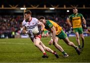 26 February 2022; Conor Meyler of Tyrone in action against Jason McGee of Donegal during the Allianz Football League Division 1 match between Donegal and Tyrone at MacCumhaill Park in Ballybofey, Donegal. Photo by Stephen McCarthy/Sportsfile